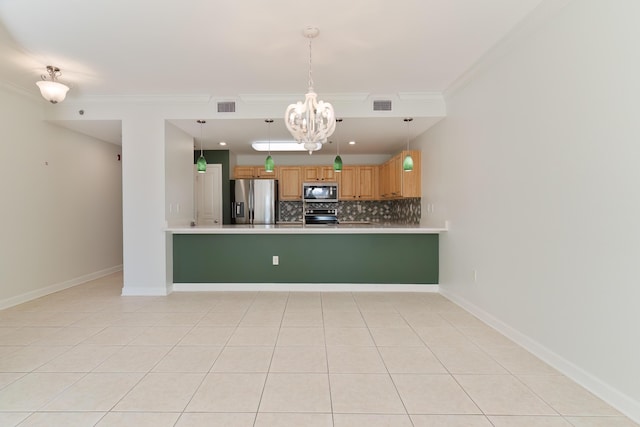 kitchen with tasteful backsplash, appliances with stainless steel finishes, a notable chandelier, and visible vents