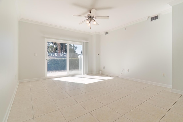 unfurnished room with baseboards, visible vents, ornamental molding, and a ceiling fan