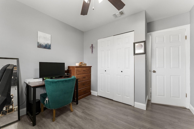 home office featuring ceiling fan and wood-type flooring