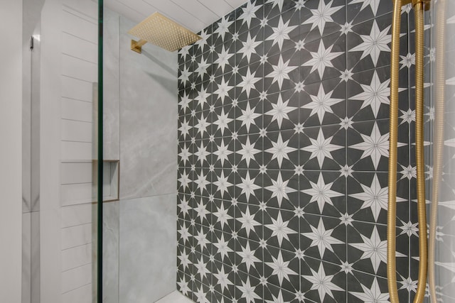 full bathroom with a tile shower