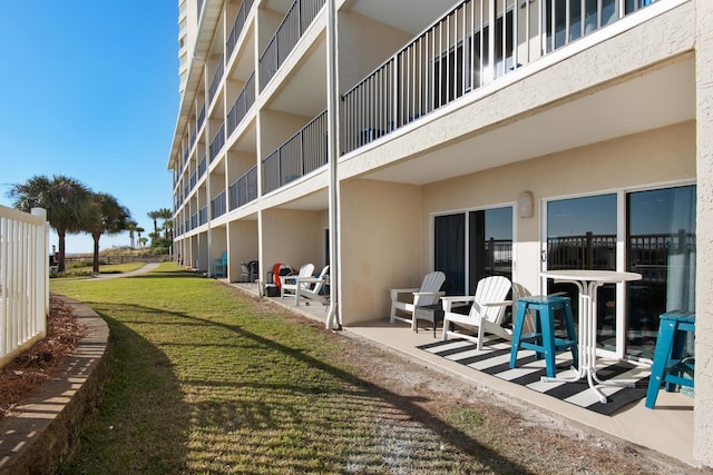 exterior space with a yard and a patio