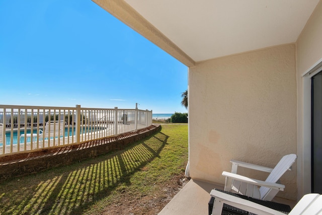 exterior space with a fenced in pool