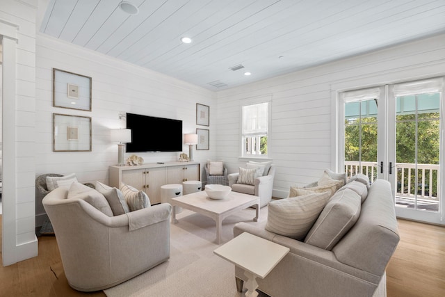 living room with light hardwood / wood-style floors