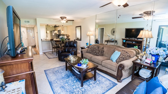 living room with light tile patterned flooring