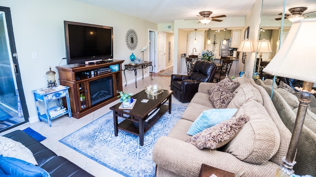 living room featuring light tile patterned flooring