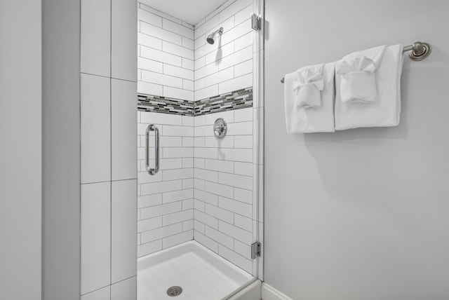 bathroom featuring an enclosed shower