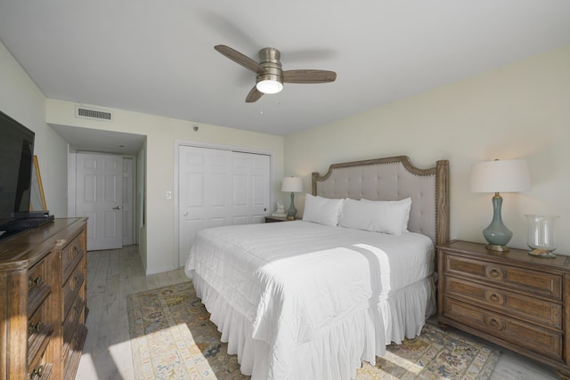 9815 US Highway 98 W Unit A202, Miramar Beach, FL 32550 - bedroom featuring a closet, light wood finished floors, and a ceiling fan