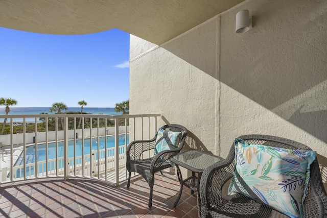 9815 US Highway 98 W Unit A202, Miramar Beach, FL 32550 - balcony with view of pool and a water view