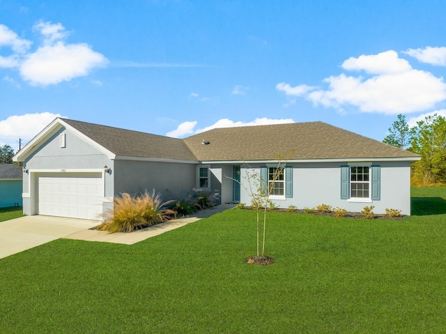 single story home featuring a garage and a front yard