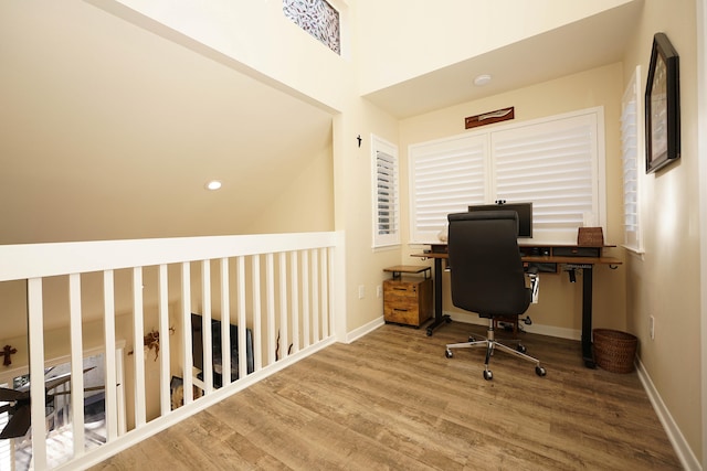 office area with hardwood / wood-style flooring