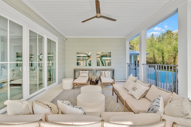 sunroom / solarium with ceiling fan