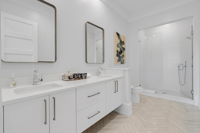 bathroom featuring vanity, toilet, ornamental molding, parquet flooring, and a shower with shower door