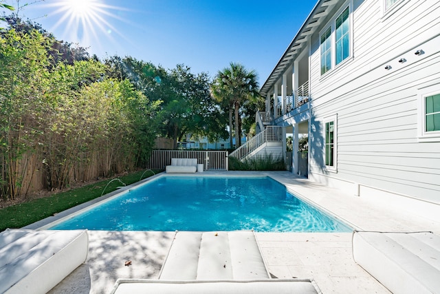 view of pool featuring pool water feature