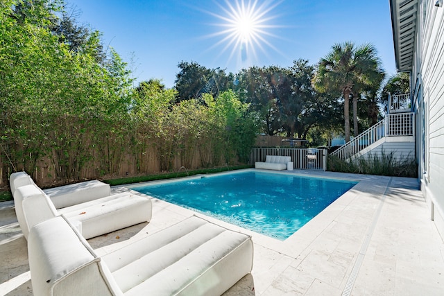 view of pool featuring a patio area