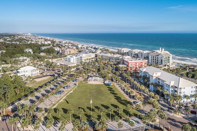 drone / aerial view with a water view and a view of the beach