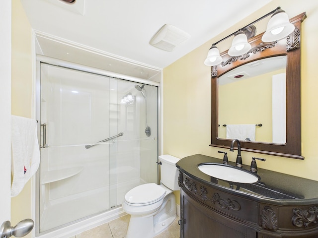 151 Calhoun Ave Unit 301, Destin, FL 32541 - bathroom featuring vanity, toilet, tile patterned flooring, and a stall shower