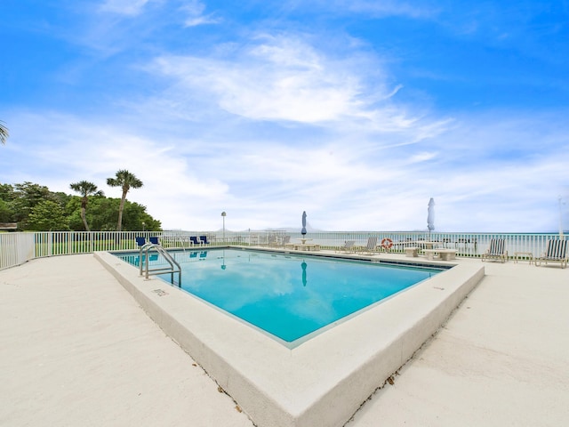 151 Calhoun Ave Unit 301, Destin, FL 32541 - community pool featuring a patio and fence