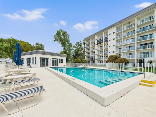 151 Calhoun Ave Unit 301, Destin, FL 32541 - community pool with fence and a patio