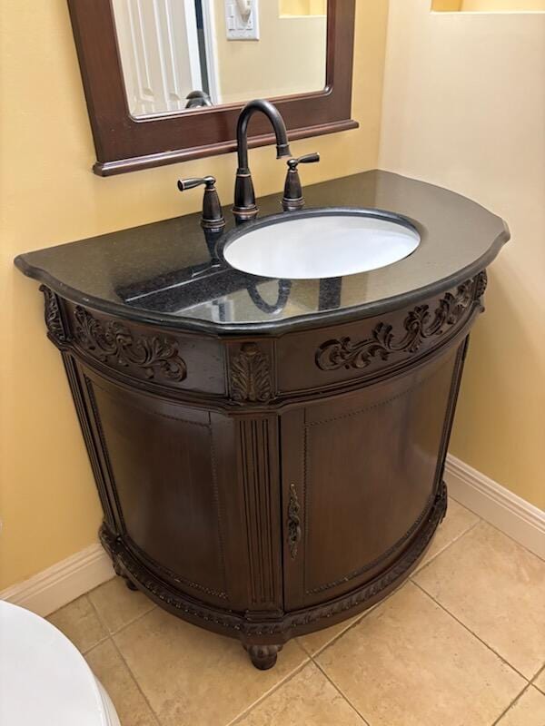 151 Calhoun Ave Unit 301, Destin, FL 32541 - interior space with baseboards, tile patterned flooring, and vanity