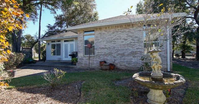 back of house featuring a patio