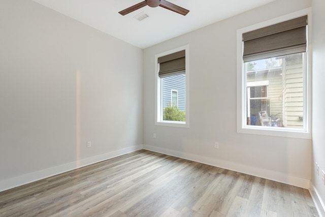 277 Edens Landing Cir, Santa Rosa Beach, FL 32459 - spare room featuring a ceiling fan and light wood-style floors