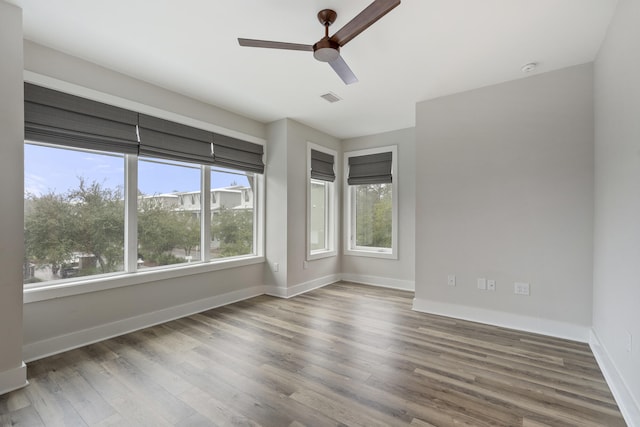 277 Edens Landing Cir, Santa Rosa Beach, FL 32459 - empty room featuring ceiling fan and wood finished floors