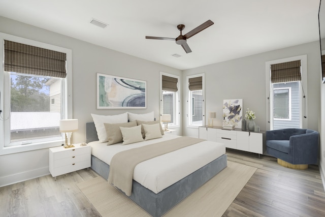 bedroom featuring hardwood / wood-style flooring and ceiling fan