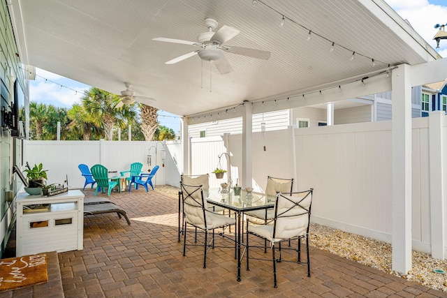 135 Grayling Way, Inlet Beach, FL 32461 - fenced backyard featuring a patio area, ceiling fan, and outdoor dining area