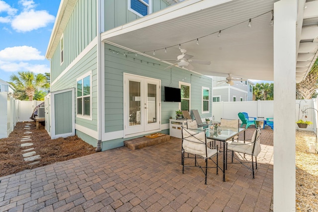 135 Grayling Way, Inlet Beach, FL 32461 - fenced backyard featuring a patio, french doors, a ceiling fan, and outdoor dining space