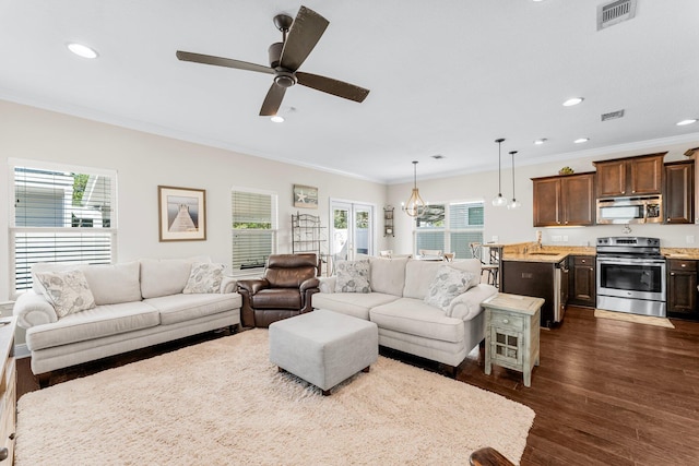 135 Grayling Way, Inlet Beach, FL 32461 - living room with crown molding, recessed lighting, a ceiling fan, and dark wood-type flooring