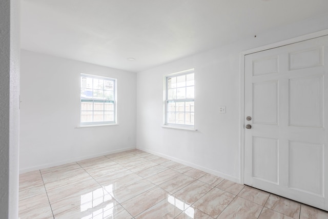 view of tiled spare room