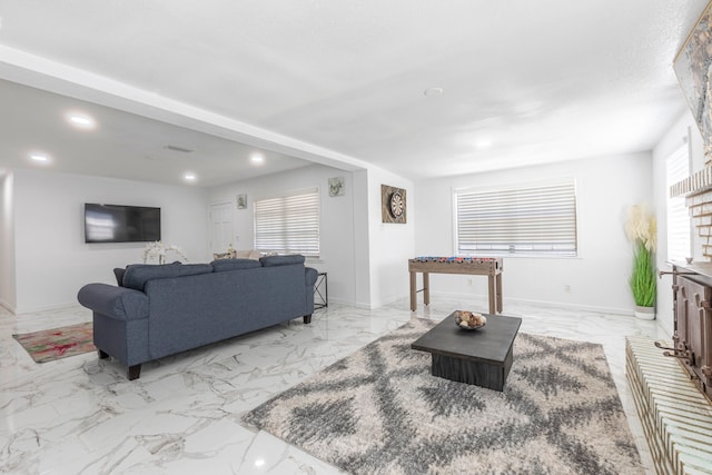 living room with plenty of natural light