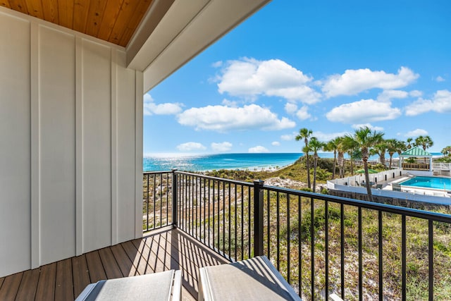 balcony featuring a water view