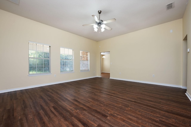 unfurnished room featuring ceiling fan and dark hardwood / wood-style floors