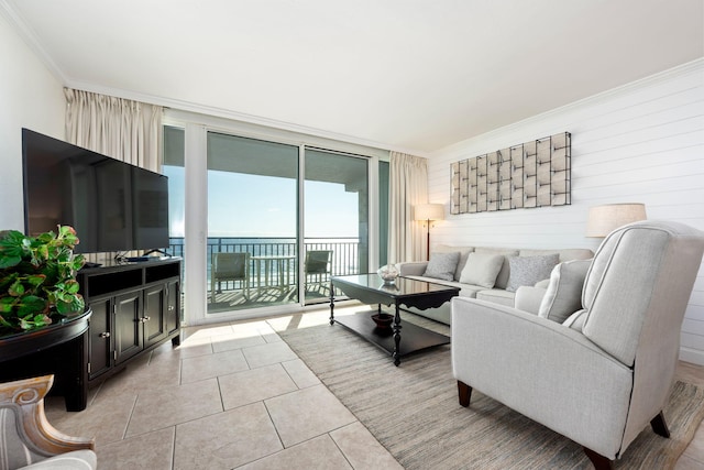 tiled living room with crown molding and floor to ceiling windows