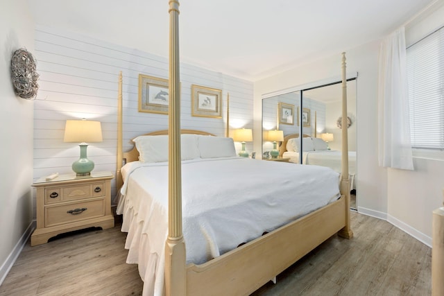 bedroom featuring a closet and wood-type flooring