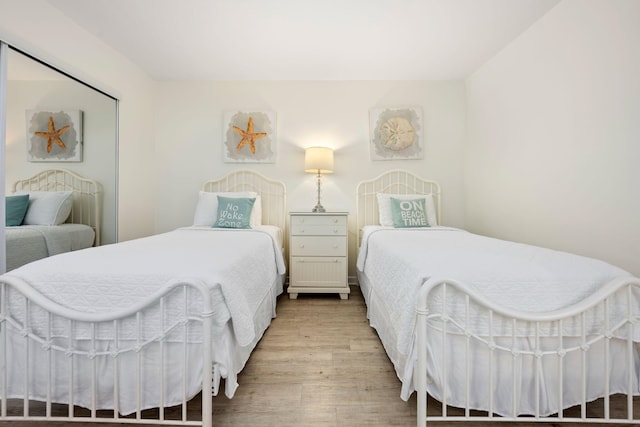 bedroom with light hardwood / wood-style floors