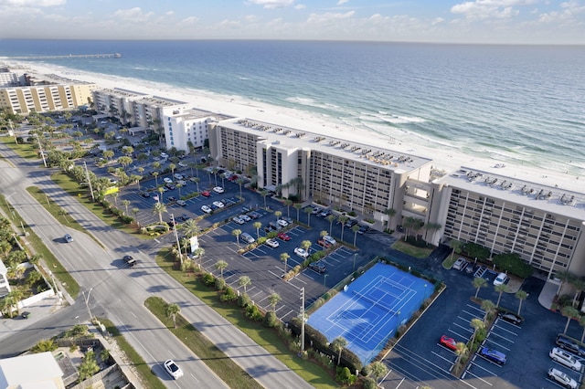 bird's eye view featuring a beach view and a water view