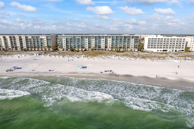 bird's eye view with a beach view and a water view