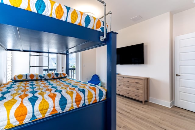 bedroom featuring hardwood / wood-style flooring