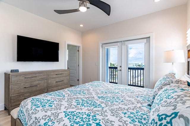 bedroom featuring ceiling fan, light wood-type flooring, and access to outside