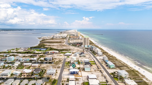 aerial view with a view of the beach and a water view