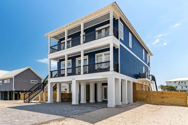 view of front of house with a balcony