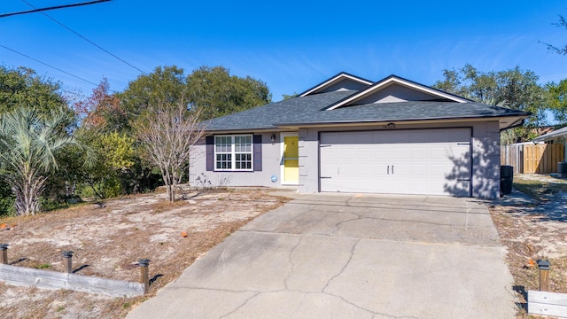 ranch-style home with a garage