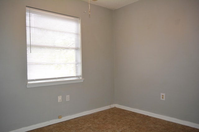 view of tiled spare room