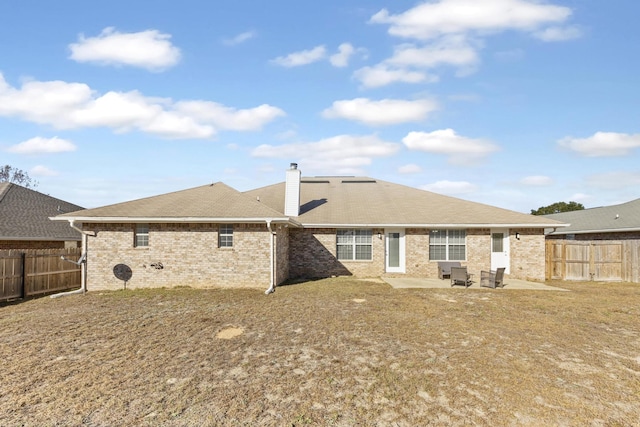 rear view of house with a patio area