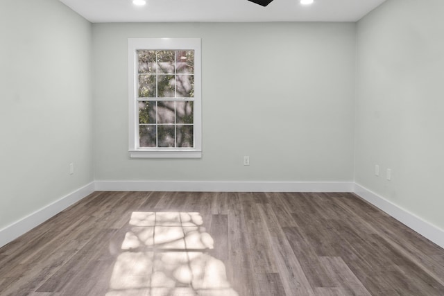59 Marigot Bay Cir, Miramar Beach, FL 32550 - spare room with baseboards, recessed lighting, and wood finished floors