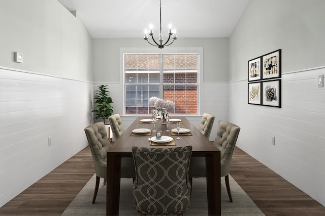 dining space featuring dark hardwood / wood-style flooring and a notable chandelier