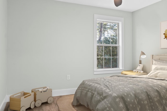 59 Marigot Bay Cir, Miramar Beach, FL 32550 - bedroom with wood finished floors, baseboards, and ceiling fan
