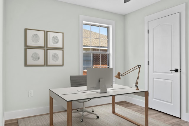 59 Marigot Bay Cir, Miramar Beach, FL 32550 - office area featuring baseboards and wood finished floors